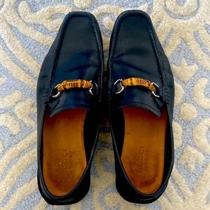 Black men’s Gucci loafers w bamboo and silver detailing